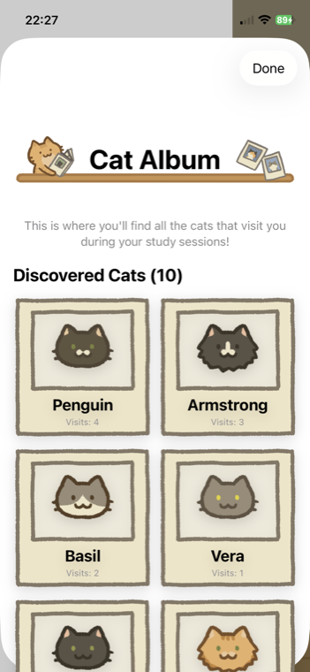 Cat Album screen showing discovered cats with visit counts